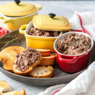 Bowl with Instant Pot Chopped Liver and toast with it.