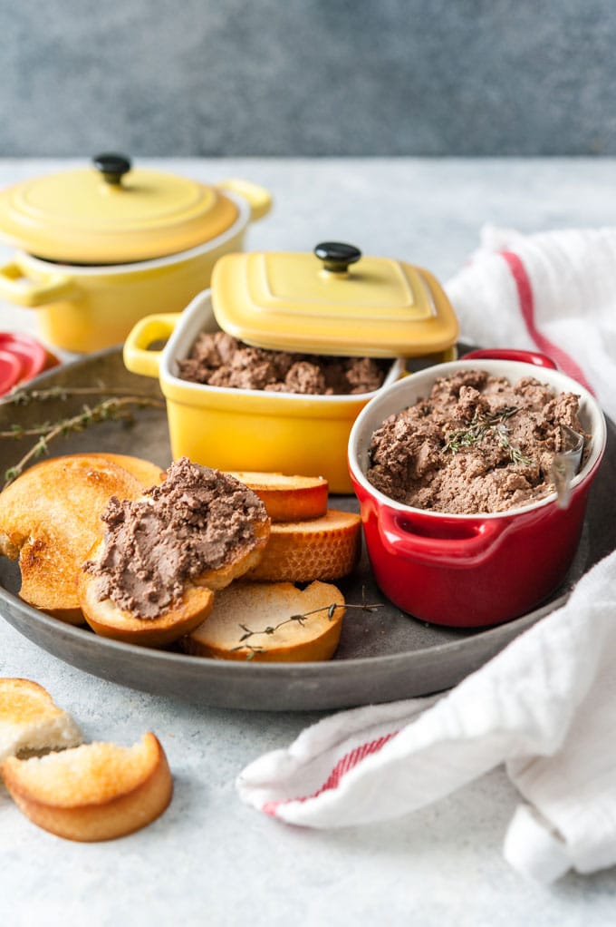 Bowl with Instant Pot Chopped Liver and toast with it.